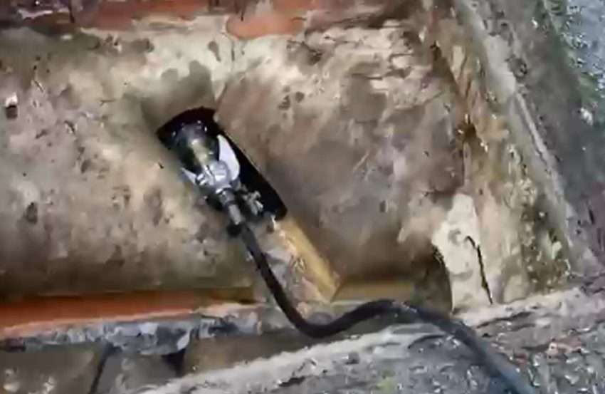 Engineer performing high-pressure drain jetting in Bournemouth to clear blockages and prevent expensive repairs using WJA-certified equipment.