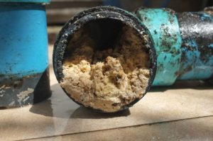 Kitchen sink drain with odour vapour showing bad drain smell problem in Bournemouth home