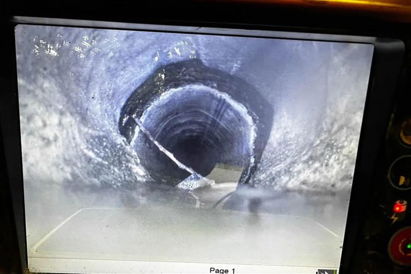 CCTV drain camera inspecting pipe interior for drain survey cost Bournemouth guide